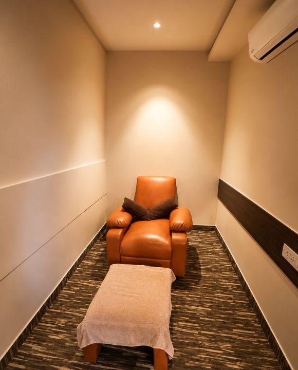 Certified reflexologist at ilaa India performing a foot treatment in Adyar, Chennai — replace with actual photo (580x720px)