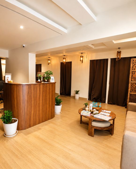 Certified reflexologist at ilaa India performing a foot treatment in Adyar, Chennai — replace with actual photo (580x720px)